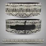 Tribal patterned leather weightlifting belt featuring black and beige geometric and ethnic motifs with a solid black lever buckle.