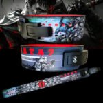 Anime-inspired Berserk weightlifting belt with Guts artwork, skull graphics, and black lever buckle for gym and bodybuilding use.