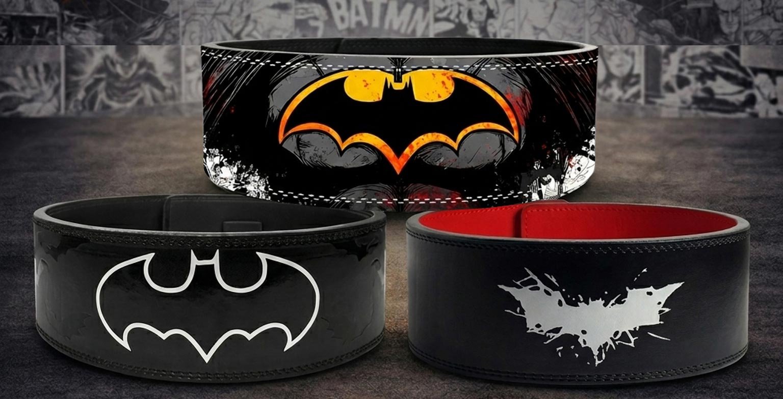 Three custom weightlifting belts showcasing Batman designs, including a top belt with a glowing orange and yellow bat symbol on a distressed black background, a bottom left belt featuring a minimalist white outline of a bat logo on solid black, and a bottom right belt with a red interior and a white, grunge-style splattered bat emblem.