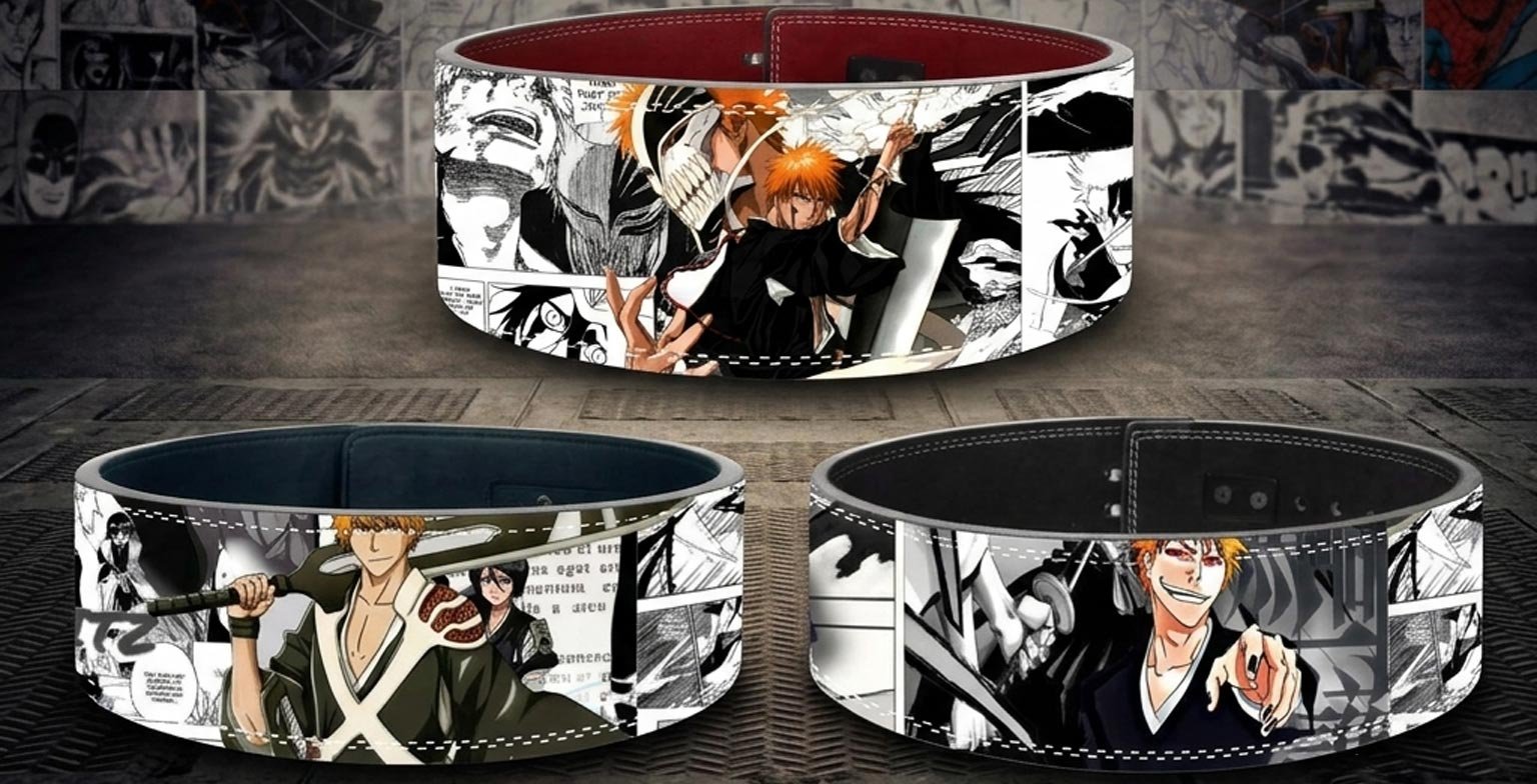 Three custom weightlifting belts featuring Bleach anime designs, including Ichigo Kurosaki in his Hollow mask form, Ichigo holding his sword over his shoulder, and a black-and-white manga panel collage with a black lever buckle.