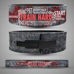 Angled view of Train Hard weightlifting belt artwork with red lettering, white gym typography and distressed grey print