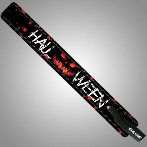 Full view of a black Halloween weightlifting belt with a red pumpkin face, red splatters, and white Halloween lettering.