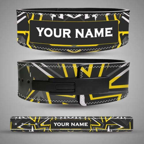 Camo Series personalised lever lifting belt with yellow, grey and black geometric graphics, showing the name panel, black lever buckle and flat belt layout.