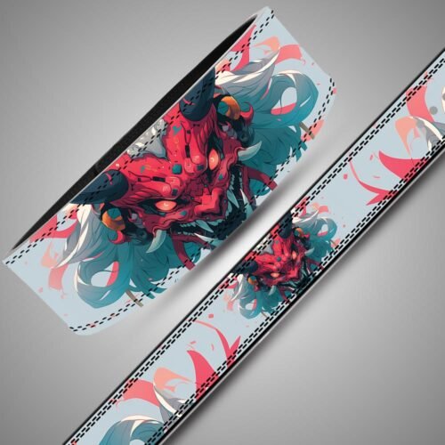 Angled close-up and flat strap view of a horned Oni mask lifting belt with flowing teal and coral artwork