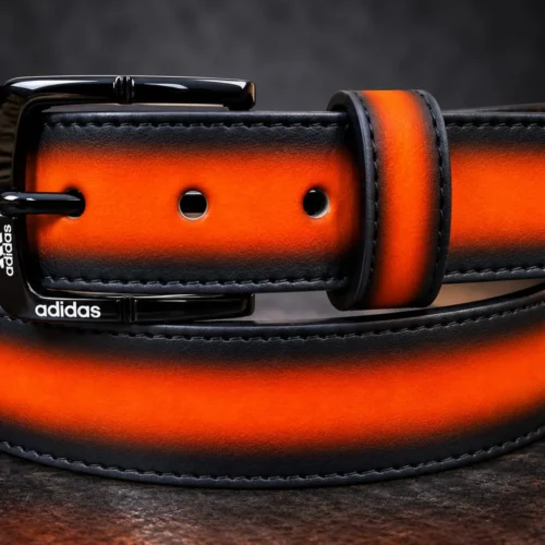 Sunset Orange pant belt with black buckle and stitched edges