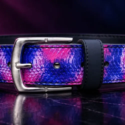 Pink and purple snakeskin-print leather pant belt with silver-tone buckle, front view