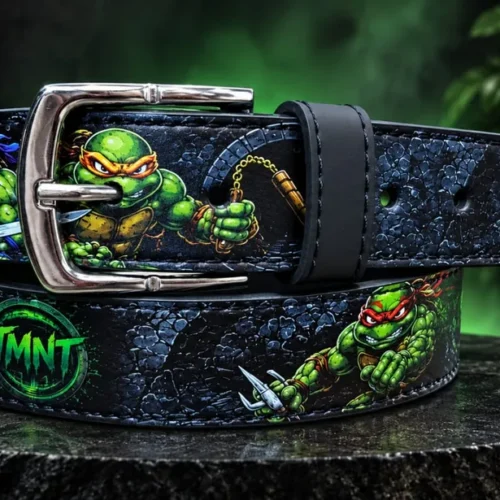 TMNT leather pant belt with Teenage Mutant Ninja Turtles artwork and silver-tone buckle, coiled view